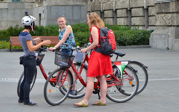 Group of cyclists on Budapest city tour with guide.