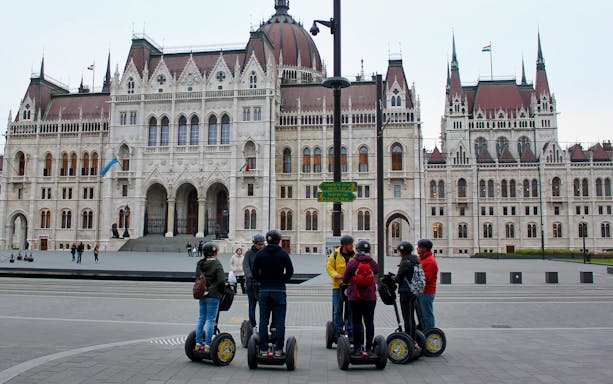 Group on Segways in front of the Hungarian Parliament Building, Budapest.