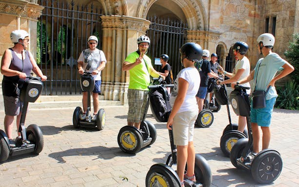 Group on Segways in Budapest City Park during a guided tour.