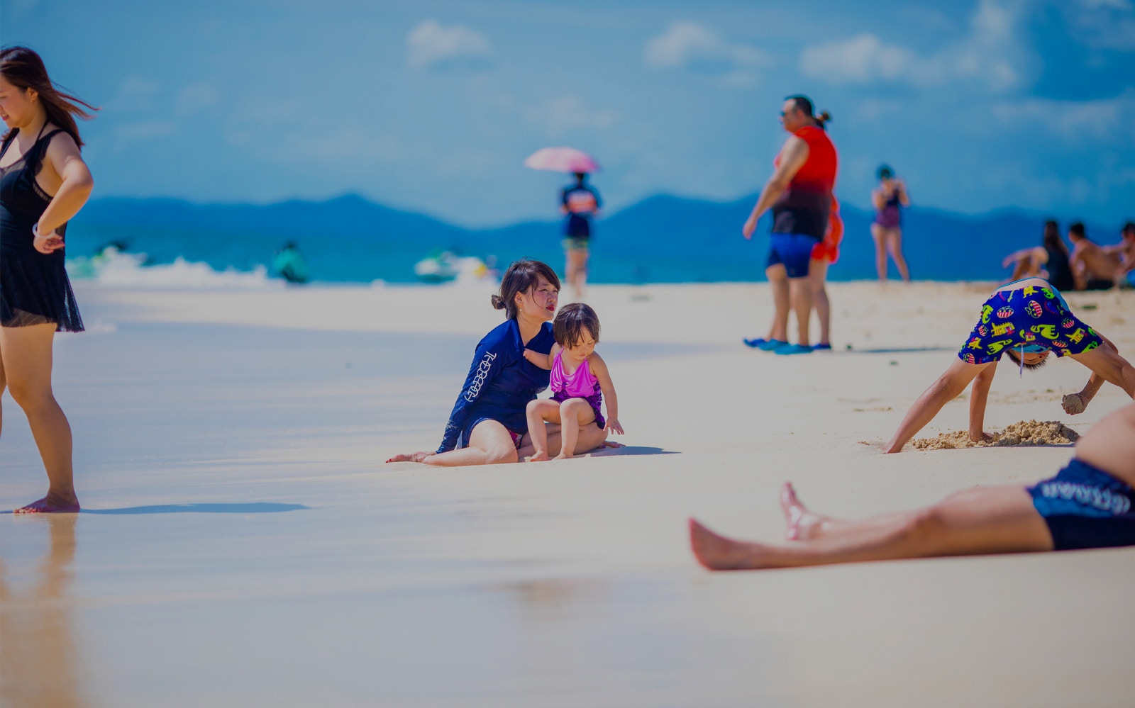Beachgoers enjoying Khai Island, part of James Bond Island snorkeling day trip, Phang Nga.
