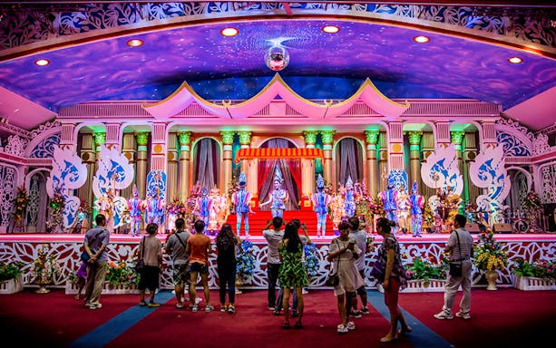 Visitors watching a colorful performance at Sukhawadee House, Pattaya.
