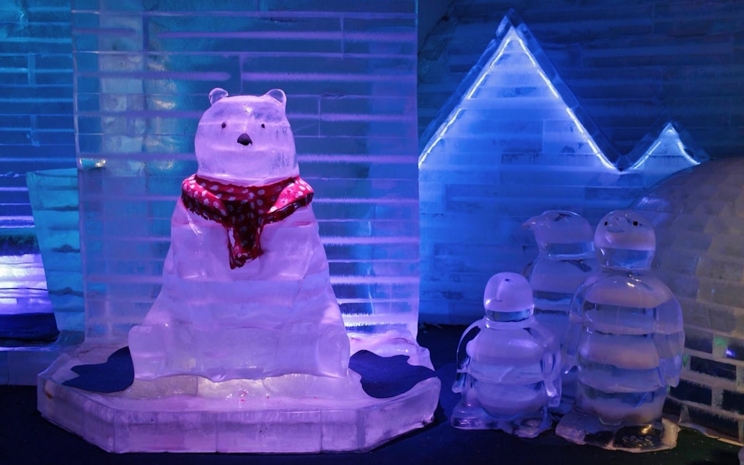 Ice sculptures of a bear and penguins at Frost Magical Ice of Siam.