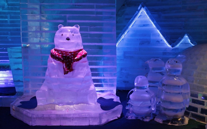 Ice sculptures of a bear and penguins at Frost Magical Ice of Siam.