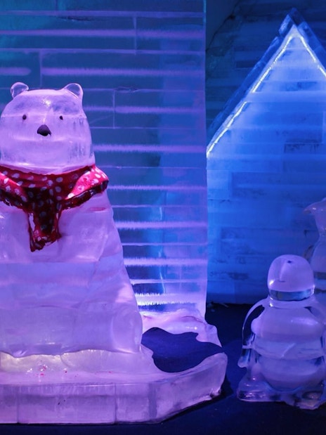 Ice sculptures of a bear and penguins at Frost Magical Ice of Siam.