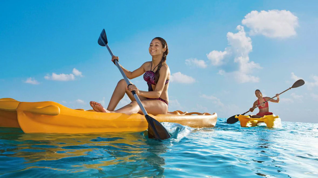 Kayaking on clear waters during Marietas Island catamaran tour.
