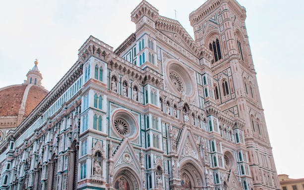 Florence Cathedral facade with Brunelleschi’s Dome in the background.