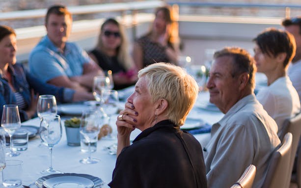 Group enjoying rooftop wine and tapas during City of Arts & Sciences tour.