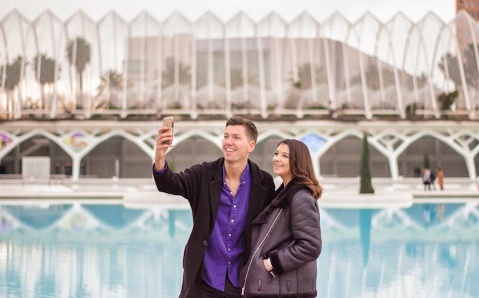 Couple taking a selfie at the City of Arts and Sciences in Valencia.