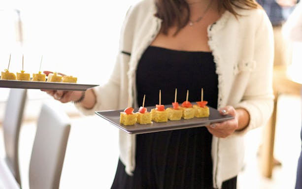 Tapas served on trays during City of Arts & Sciences rooftop tour.
