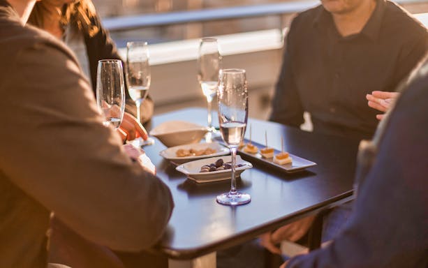 Rooftop dining with wine and tapas during City of Arts & Sciences tour in Valencia.