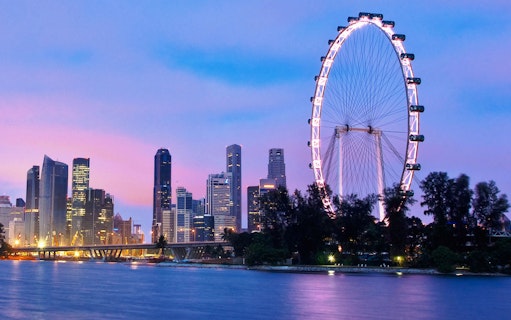 Singapore Flyer and skyline at dusk, part of Combo: Singapore Flyer with Time Capsule + Universal Studios Singapore.