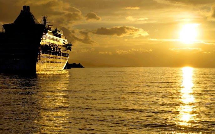 Cruise ship sailing at sunset on a Maui dinner and cocktail tour.
