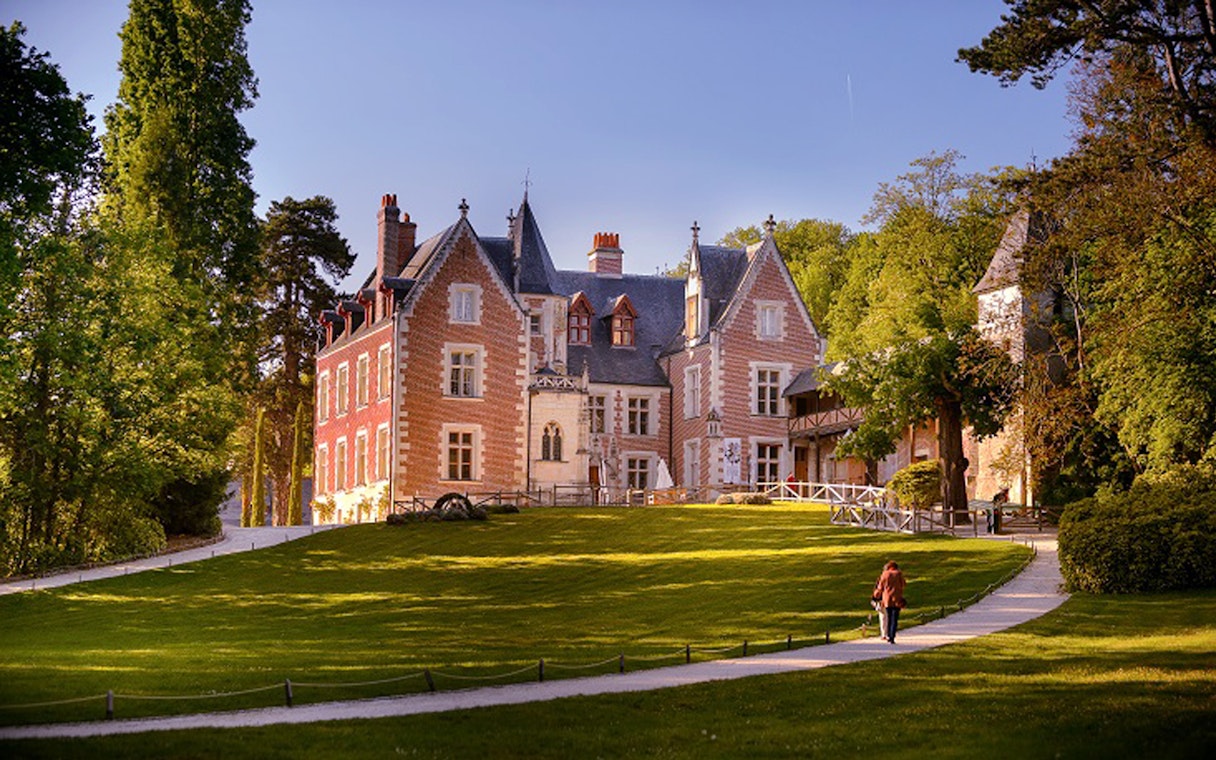 Chateau Clos Luce in Amboise, France, surrounded by lush gardens, Leonardo da Vinci's last residence.