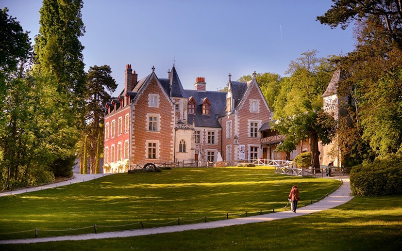Chateau Clos Luce in Amboise, France, surrounded by lush gardens, Leonardo da Vinci's last residence.