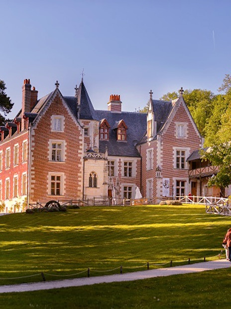 Chateau Clos Luce in Amboise, France, surrounded by lush gardens, Leonardo da Vinci's last residence.