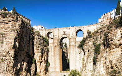 Ronda's Puente Nuevo bridge spanning a deep gorge, seen on a day trip from Málaga.