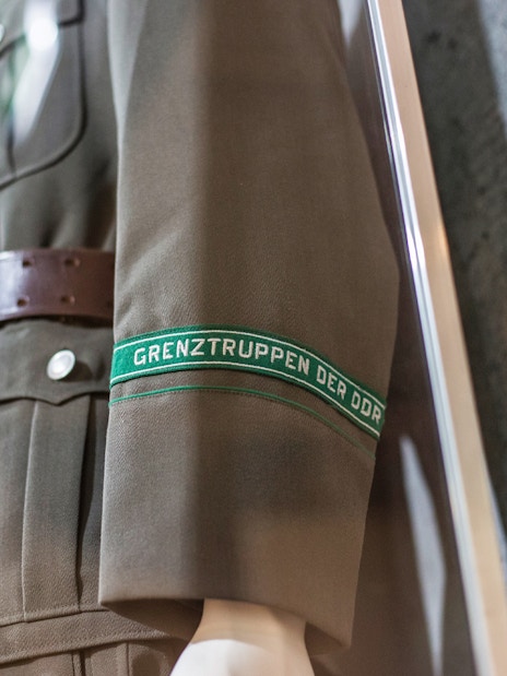 East German border troops uniform at The Wall Museum East Side Gallery.