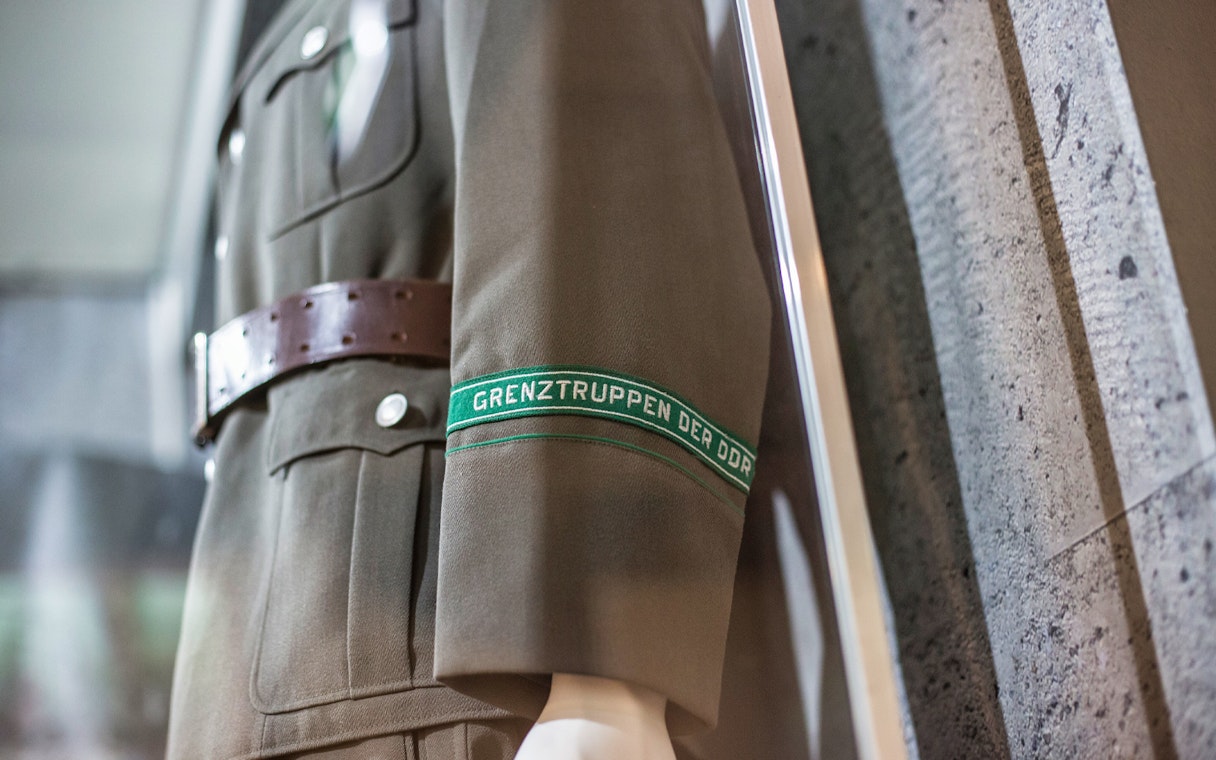 East German border troops uniform at The Wall Museum East Side Gallery.