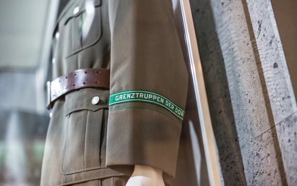 East German border troops uniform at The Wall Museum East Side Gallery.