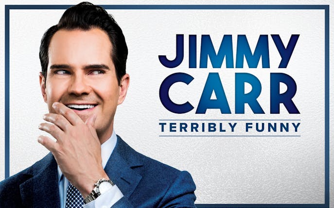 Comedian smiling with hand on face, text reads 'Jimmy Carr: Terribly Funny'