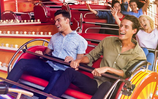 Visitors enjoying a ride at Luna Park Sydney.
