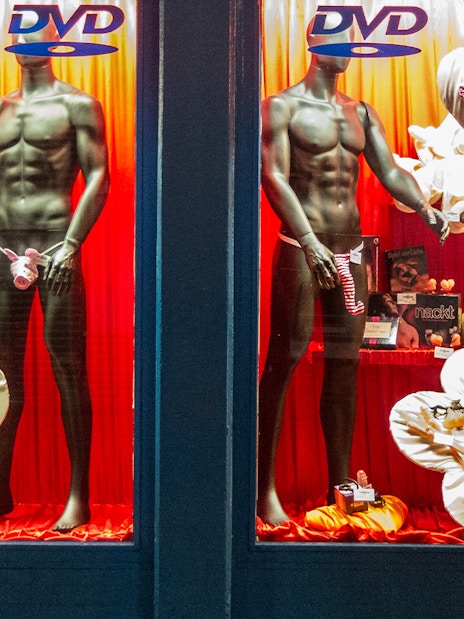 Storefront display with mannequins in lingerie, St. Pauli, Hamburg, for adult tour.