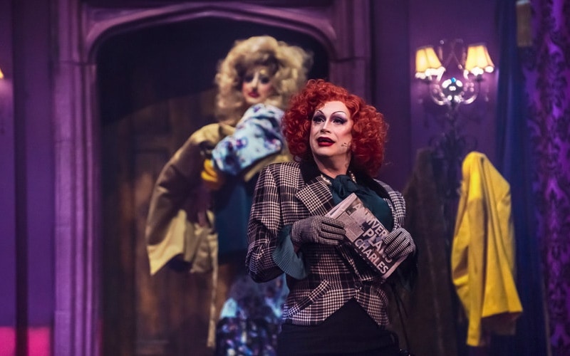 Performers in theatrical costumes during "Death Drop Back in the Habit" show.