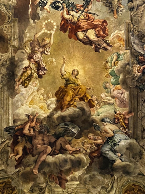 Baroque ceiling fresco at Palazzo Barberini, Rome, depicting mythological figures and divine scenes.
