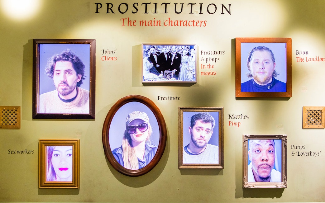 Framed portraits at Red Light Secrets Museum of Prostitution, Amsterdam.