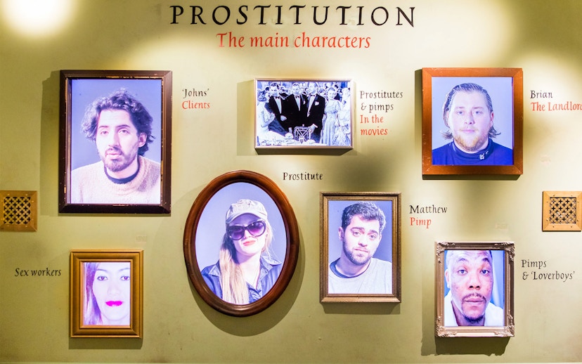 Framed portraits at Red Light Secrets Museum of Prostitution, Amsterdam.