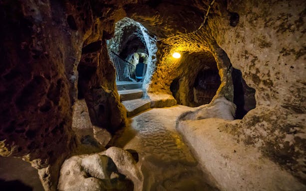 Underground cave passage in South Cappadocia, Turkey, part of the day tour experience.