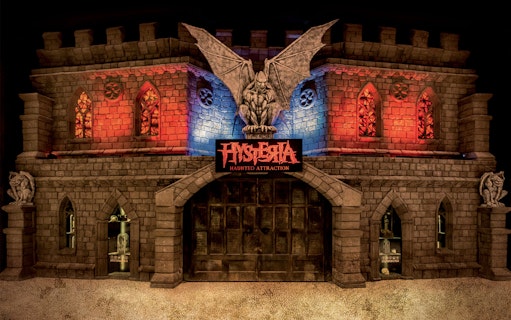 Hysteria Haunted Attraction entrance with gargoyle statues, Dubai Mall.