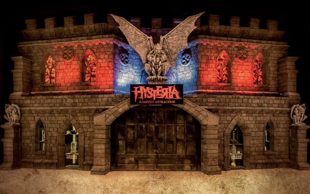 Hysteria Haunted Attraction entrance with gargoyle statues, Dubai Mall.