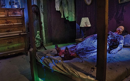 Haunted bedroom scene at Hysteria Haunted Attraction, Dubai Mall.