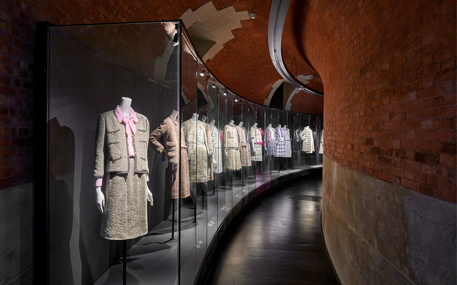 Chanel suits displayed at Palais Galliera's Gabrielle Chanel Fashion Manifesto Exhibition in Paris.