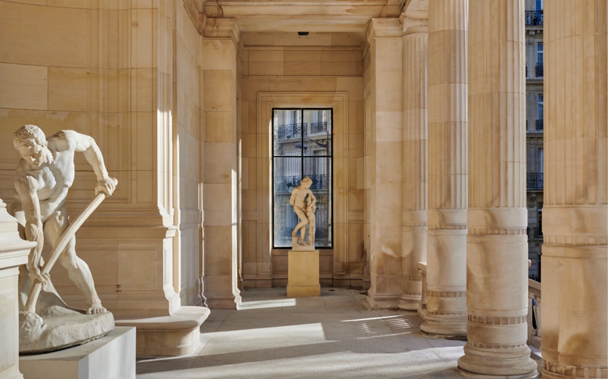 Statues and columns inside Palais Galliera, Paris, at Gabrielle Chanel Fashion Manifesto Exhibition.