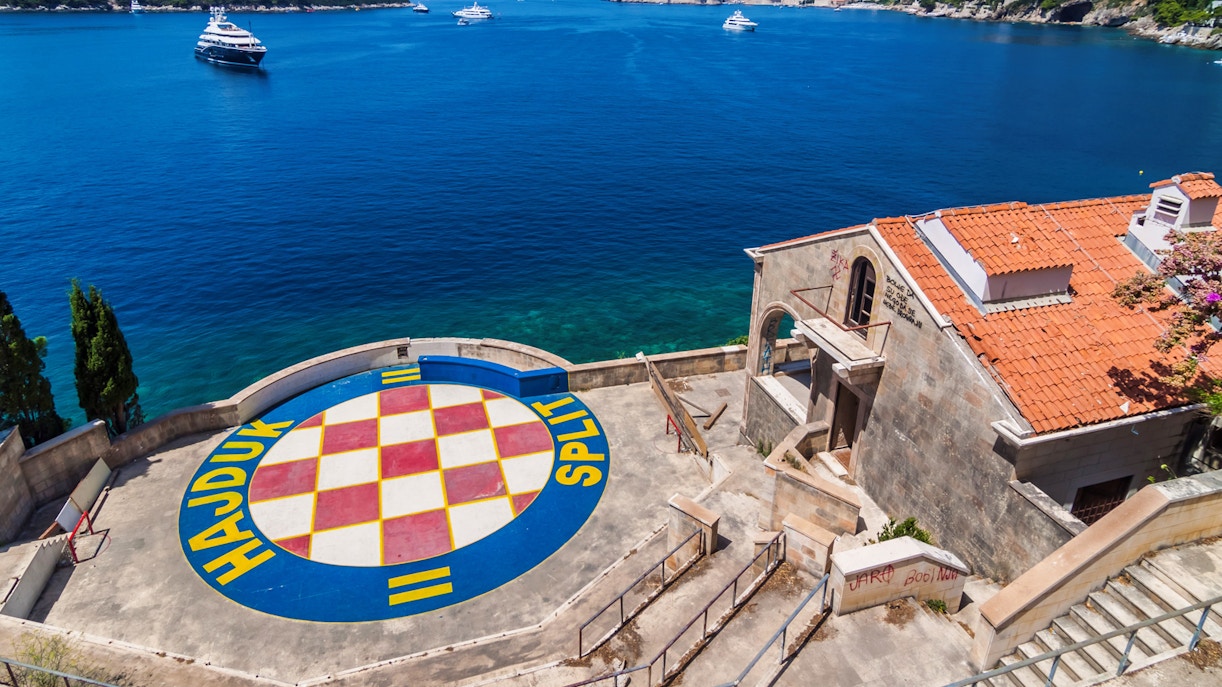 Dubrovnik coastline with Hajduk Split logo, part of Game of Thrones driving tour.