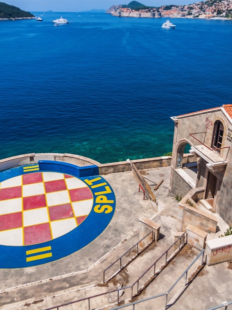 Dubrovnik coastline with Hajduk Split logo, part of Game of Thrones driving tour.