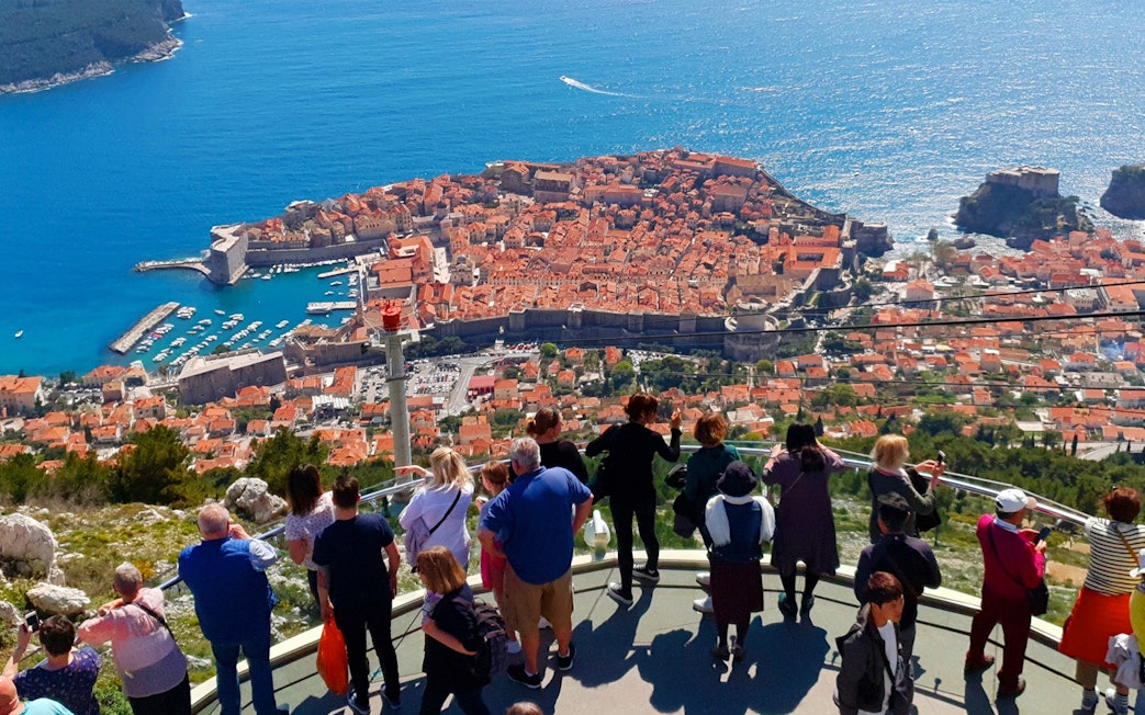 Tourists overlooking Dubrovnik, Croatia, a filming location for Game of Thrones.