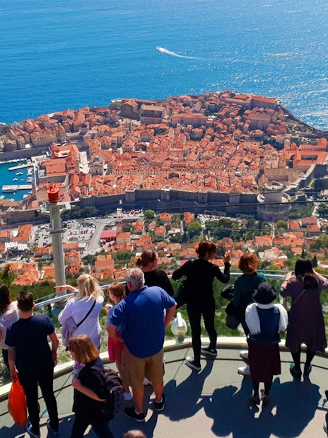 Tourists overlooking Dubrovnik, Croatia, a filming location for Game of Thrones.