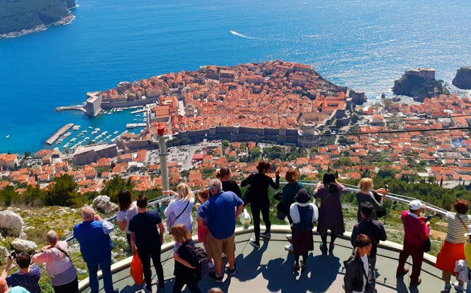 Tourists overlooking Dubrovnik, Croatia, a filming location for Game of Thrones.