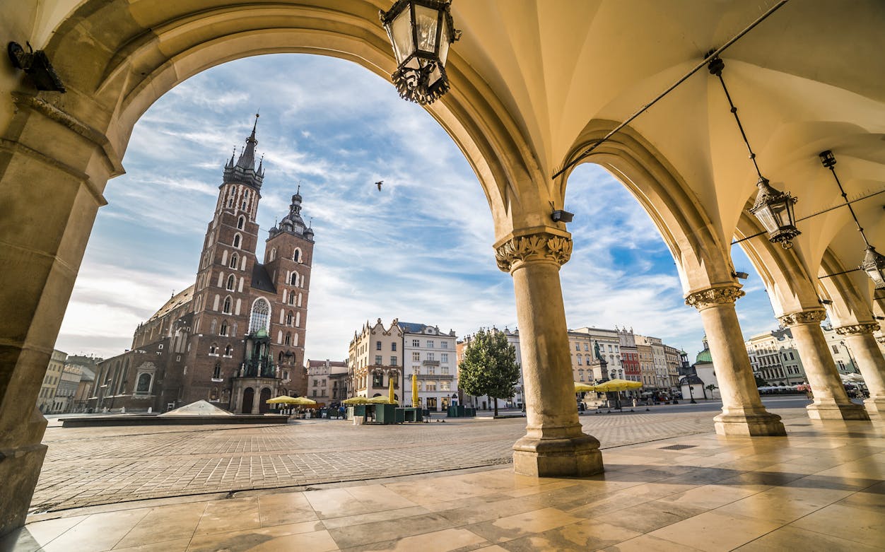 St. Mary's Basilica viewed through Cloth Hall arches in Krakow, Poland.