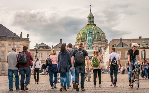 People walking near Frederik's Church in Copenhagen during a city tour.