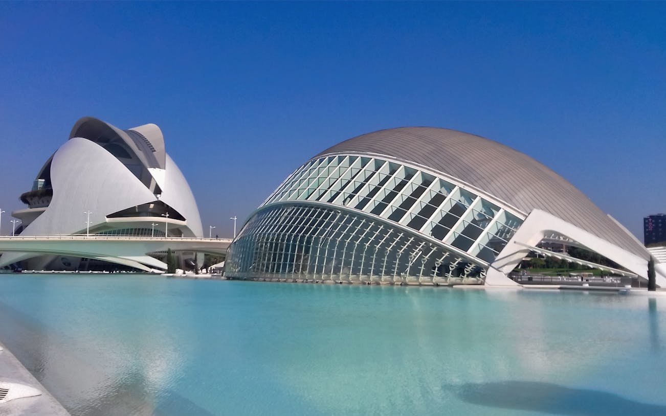 Valencia City of Arts and Sciences buildings with clear blue sky.