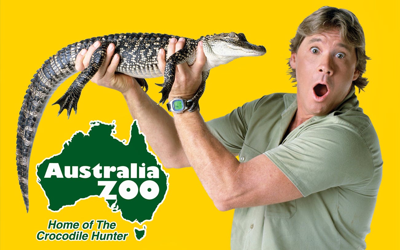 Australia Zoo logo with a person holding a small crocodile.