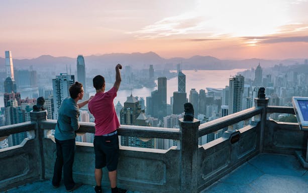 View of Hong Kong skyline from Victoria Peak during evening hike.