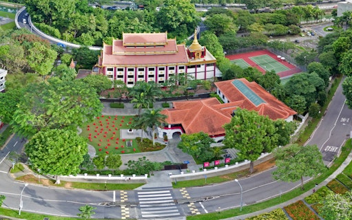 Aerial view of Sun Yat Sen Nanyang Memorial Hall with surrounding gardens and tennis courts in Singapore.