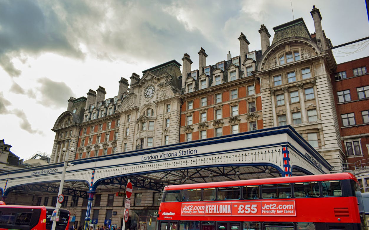 London Victoria Station with a red double-decker bus on Christmas Day.