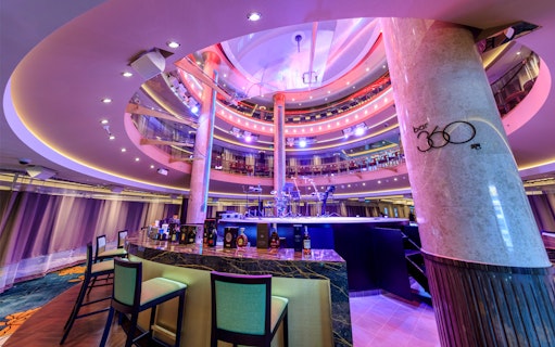 Bar 360 interior on World Dream Getaway Cruise with stage and seating area.