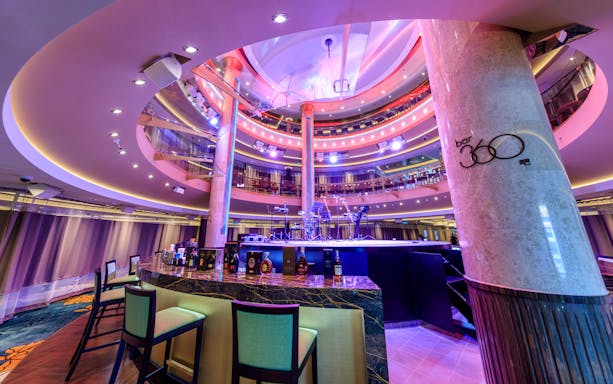 Bar 360 interior on World Dream Getaway Cruise with stage and seating area.